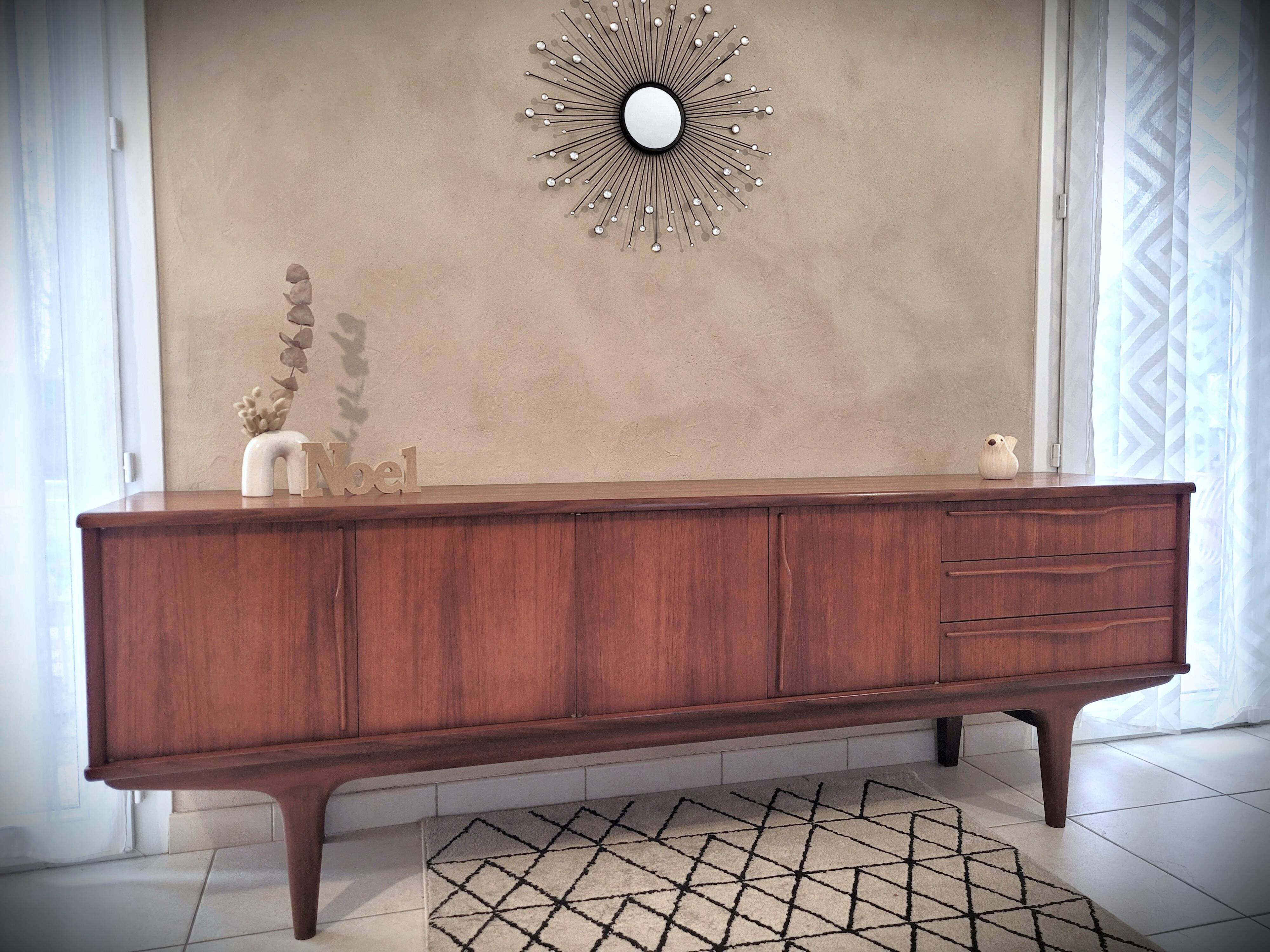 Scandinavian enfilade design in teak from the late 1960s.