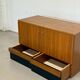 Vintage teak sideboard, mid-century style, with doors and drawers.