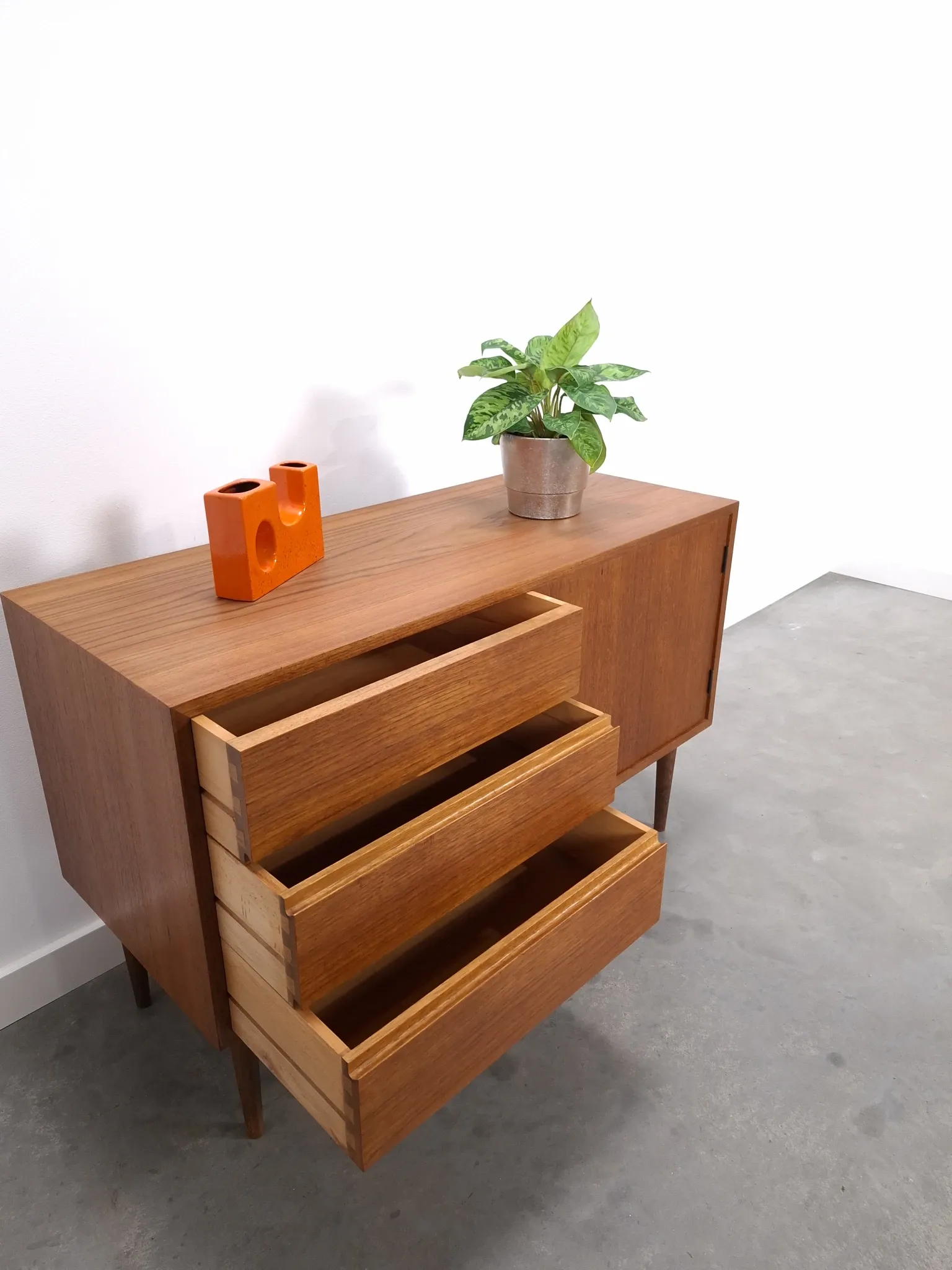 Vintage teak cabinet from the 1960s, sideboard with 3 drawers and a door.