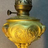 Beautiful and old oil lamp in gilded bronze, attributed to Georges Leleu
