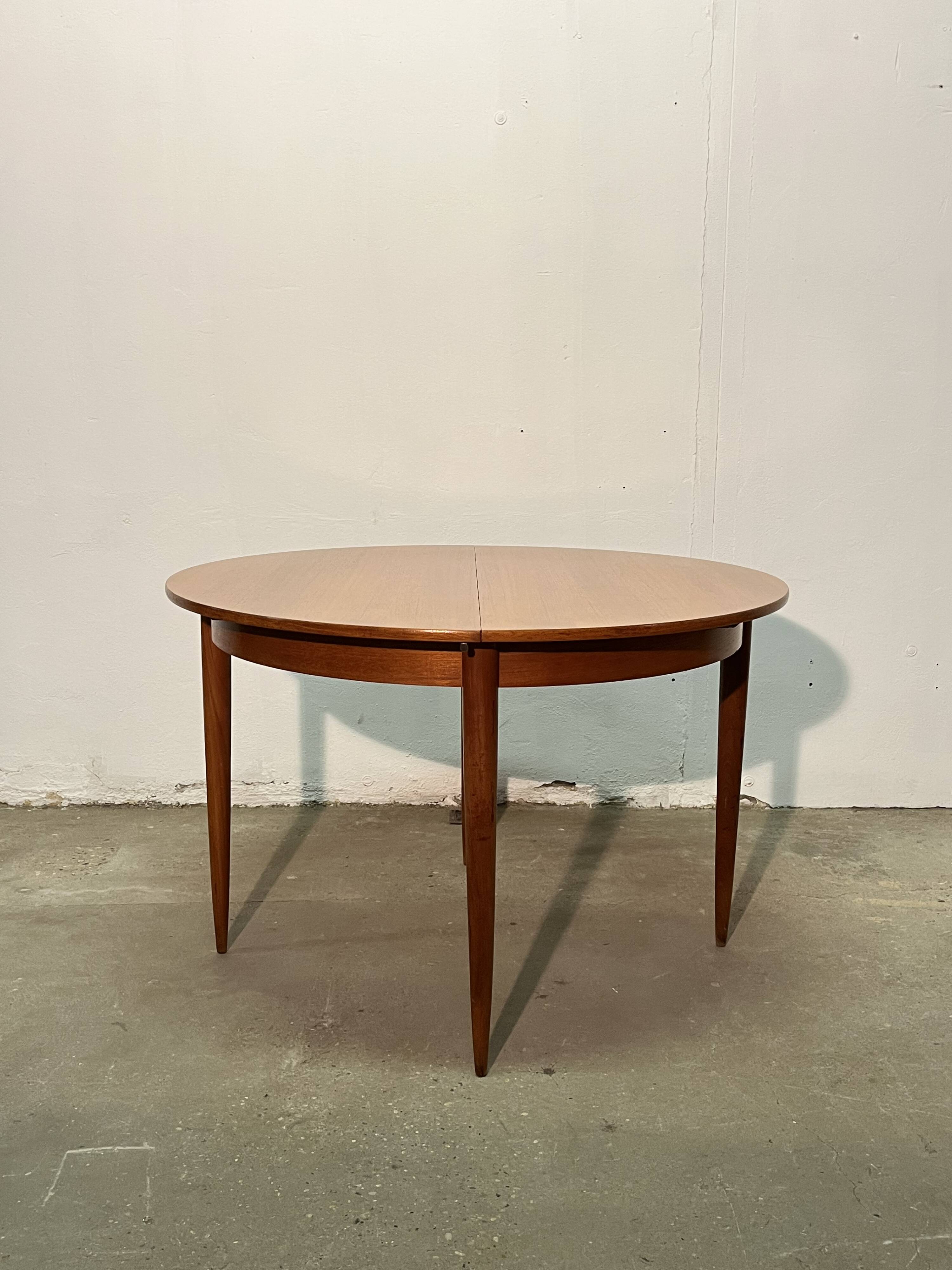 Vintage 1960s teak extendable Scandinavian table.