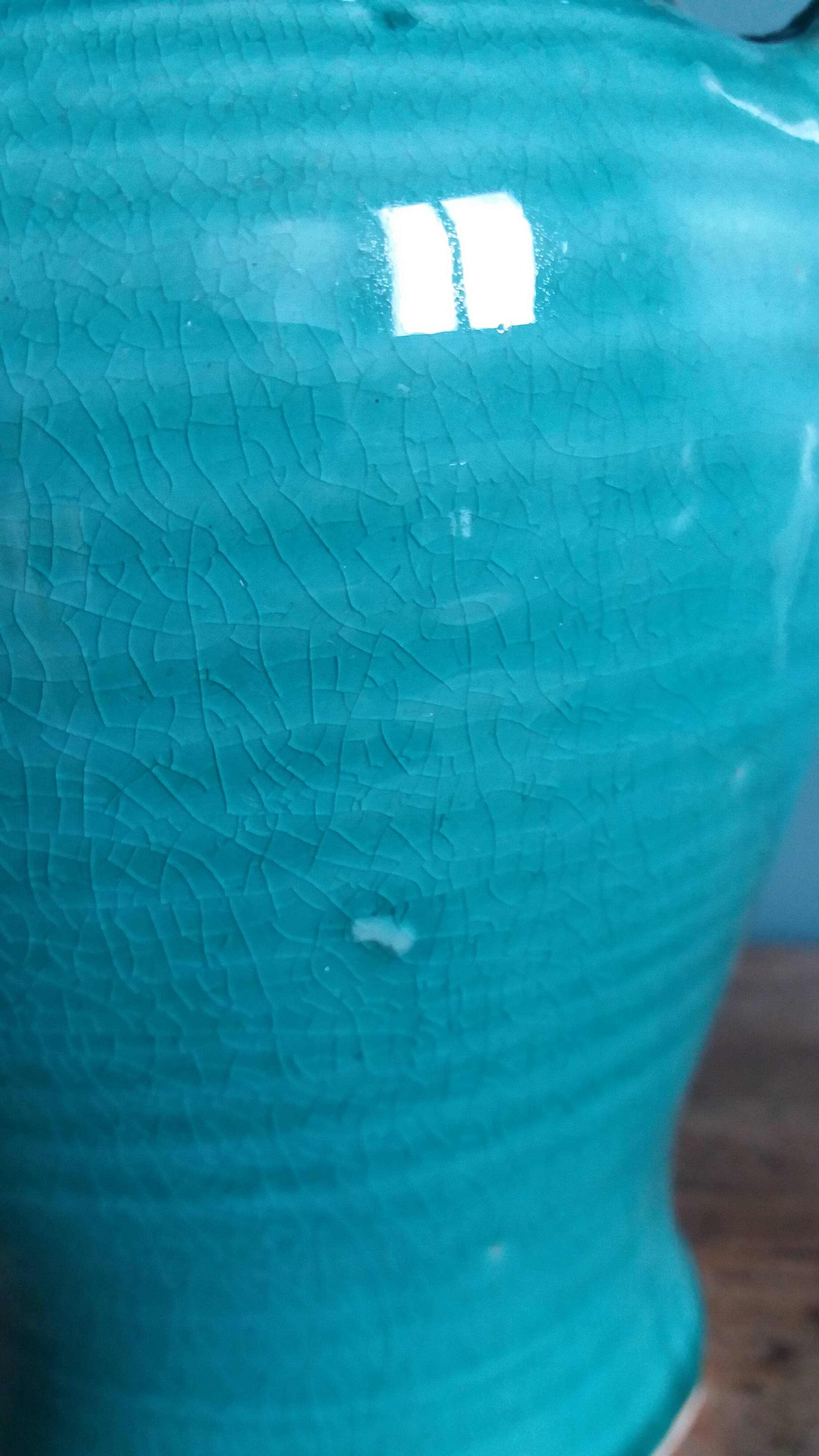 Glazed green-blue ceramic vase