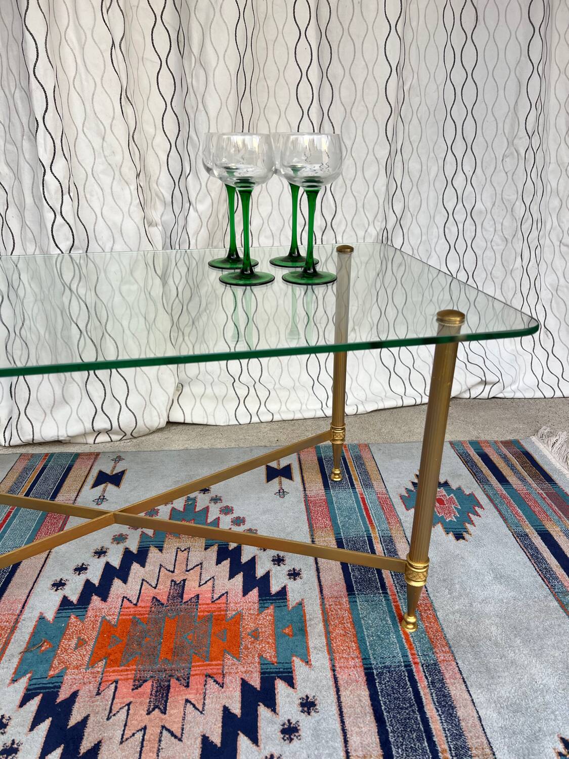 Vintage gold coffee table. Glass top.