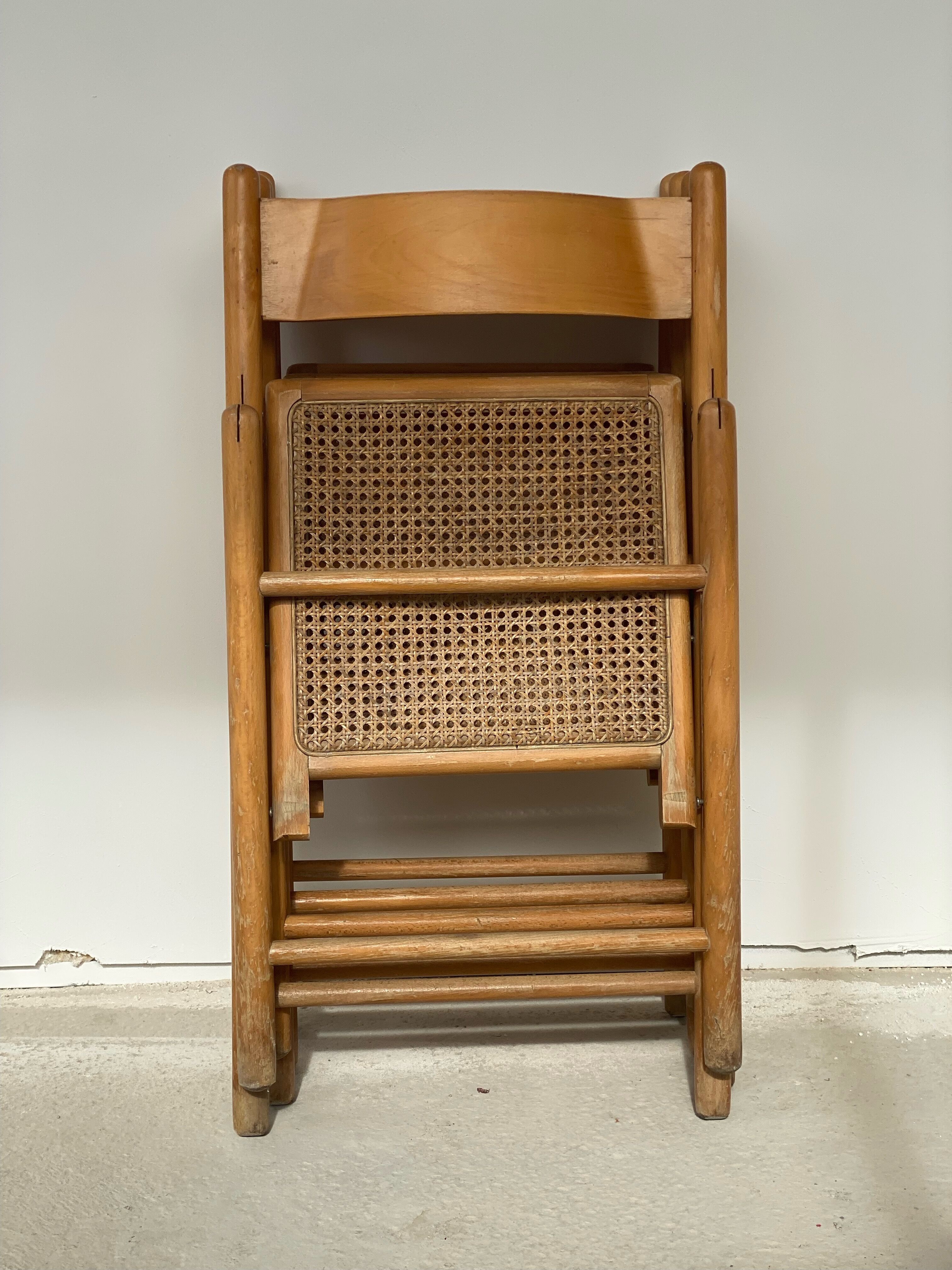 Set of 4 folding chairs, vintage design, wooden structure and canned seat. Around 1970