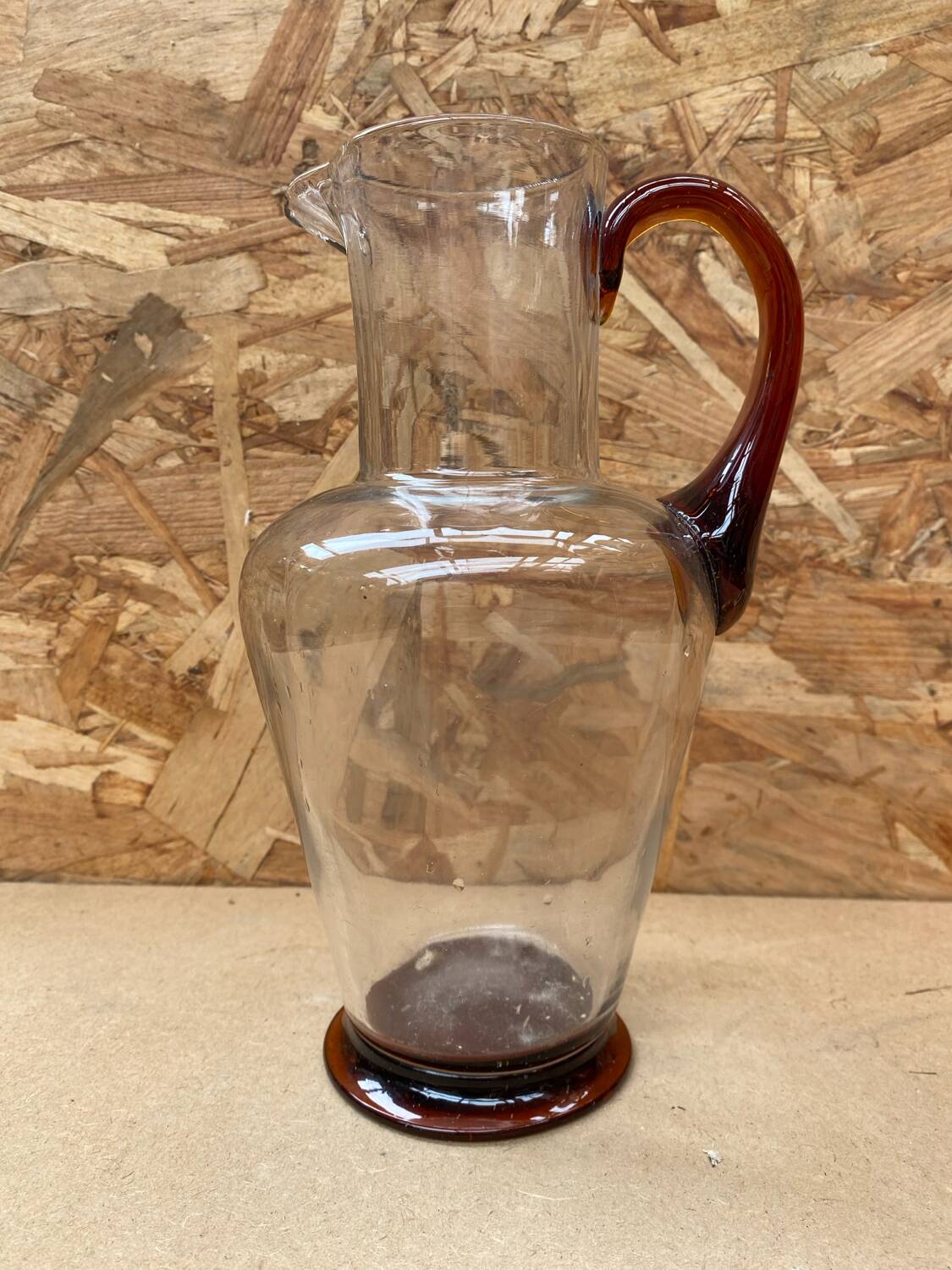 Antique clear blown glass pitcher + orange handle & foot vintage