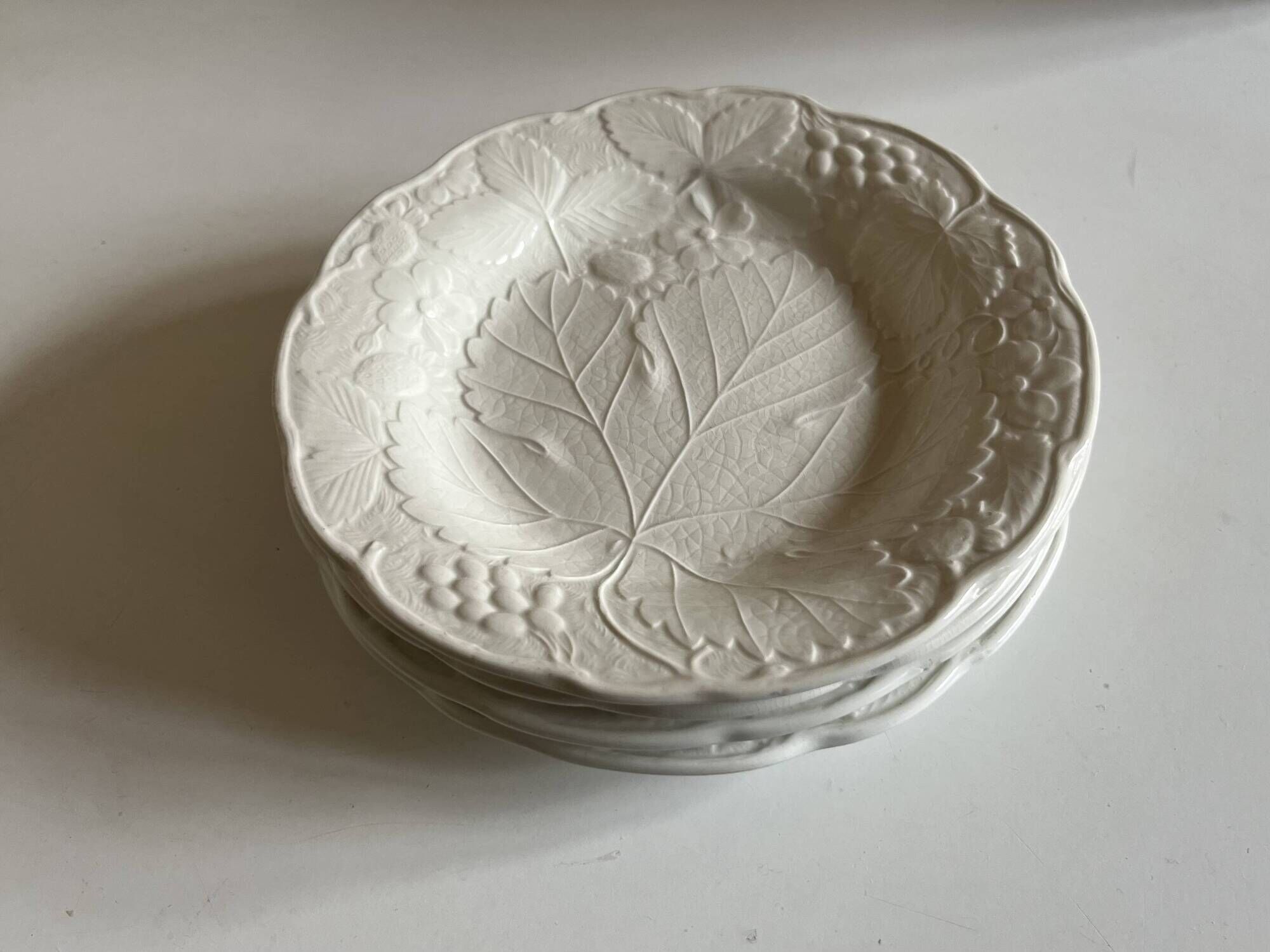Set of 5 English earthenware plates by Burleigh Davenport with raised leaf design.