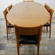 Wooden oval table and 6 matching chairs 60