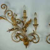 Pair of large floral wall lamps in gilded and lacquered metal. Italy 1960s