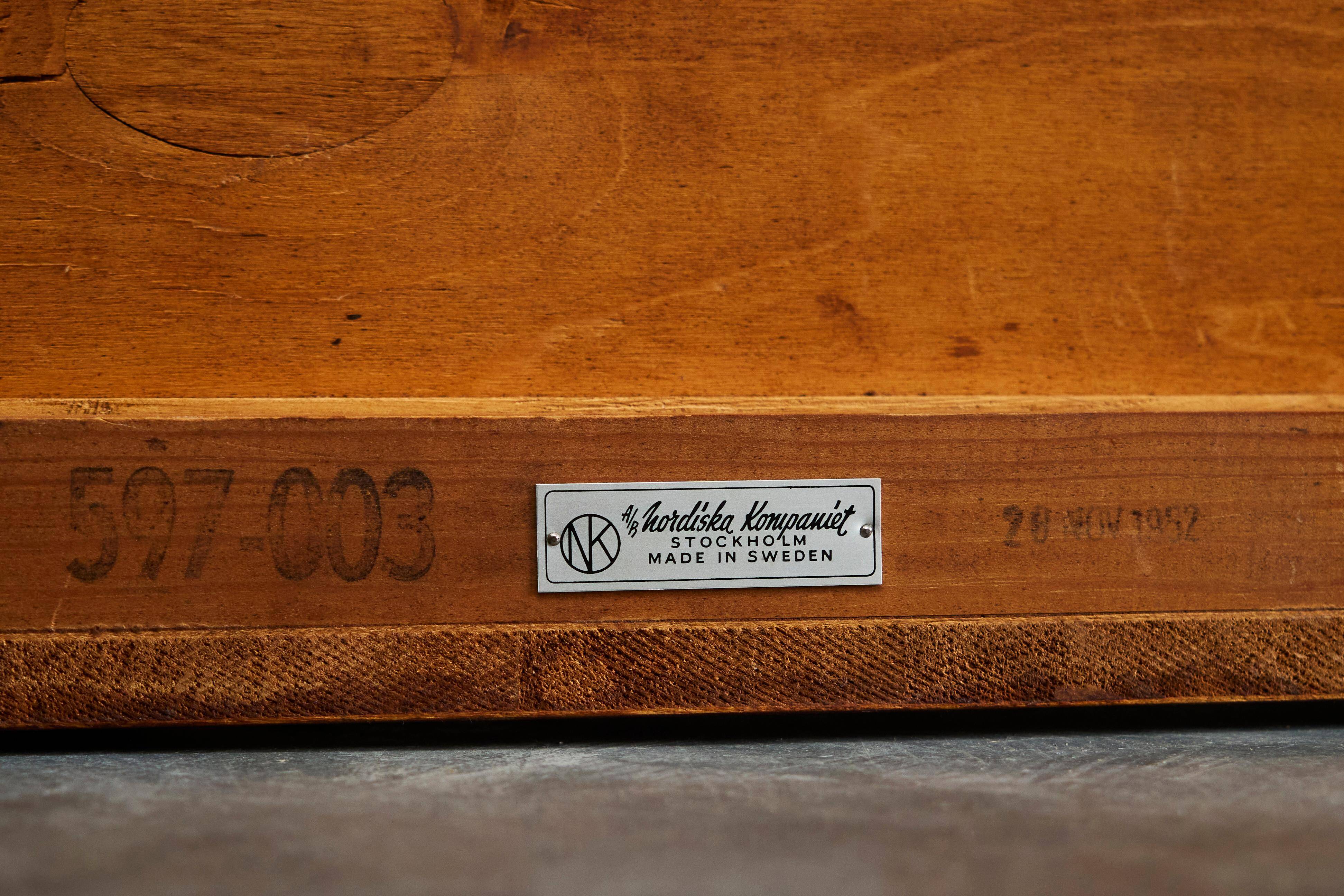 Pair of bedside tables by Nordiska Kompaniet in teak, 1952, by David Rosén.