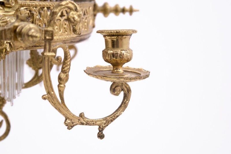 Brass chandelier from the first half of the 20th century.