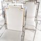 Suite de 6 fauteuils en inox et laiton