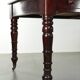 Antique English writing desk from the late 19th century with a warm colour