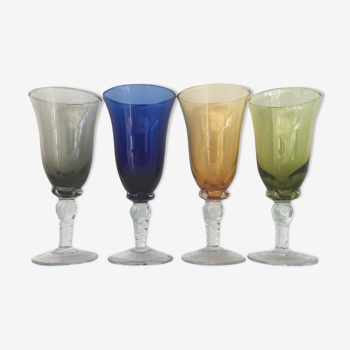 Set of four colored blown glasses