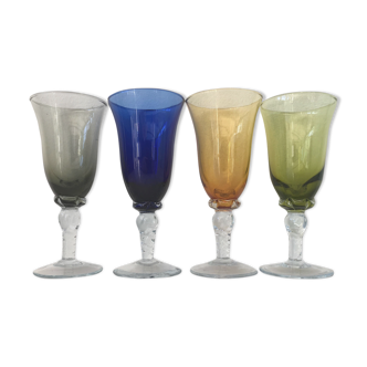 Set of four colored blown glasses