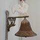 Cloche de porte en fonte