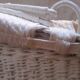 Wicker and painted wood baby cradle
