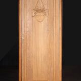 Bonnetière Art Nouveau en chêne (vers 1920).