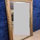 Empire period mirror in wood and gilded stucco circa 1810-1820