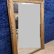 Empire period mirror in wood and gilded stucco circa 1810-1820