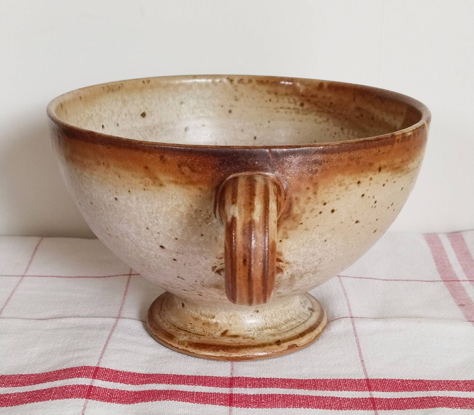 Large handmade stoneware bowl with foot