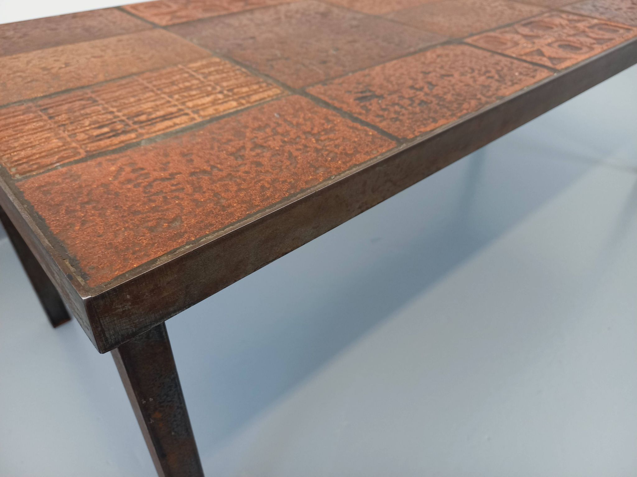 Vintage rectangular coffee table by Jean Jaffeux in steel and ceramic from the 60s