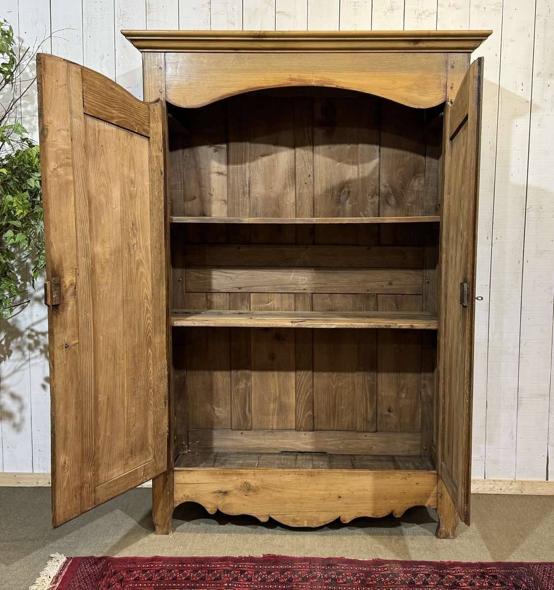 19th-century country wardrobe in blonde chestnut.