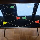 Brass and glass coffee table with compass feet