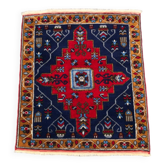 Tapis persan carré
