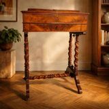 Antique wooden sewing table with drawer.