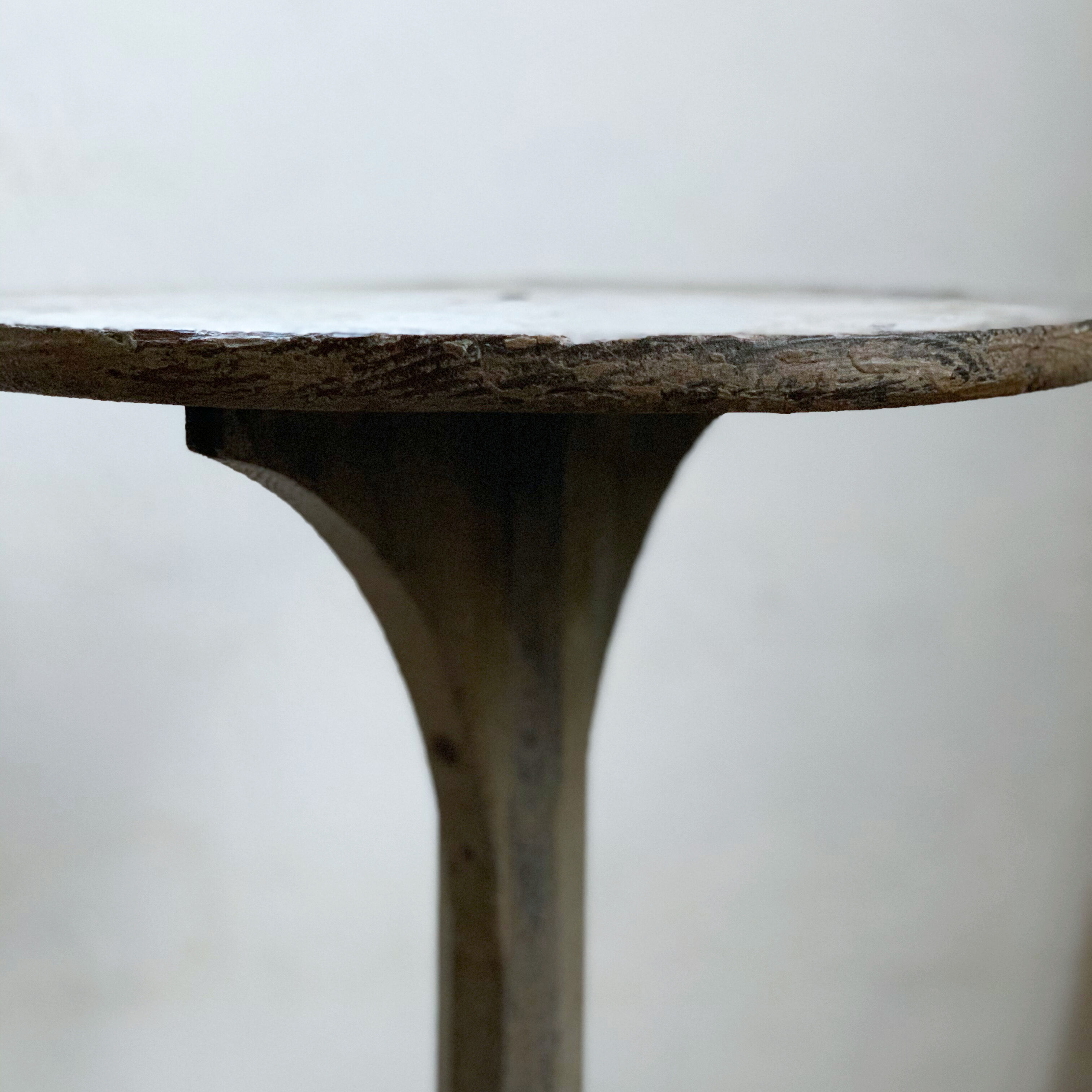 wooden pedestal or primitive winemaker's table