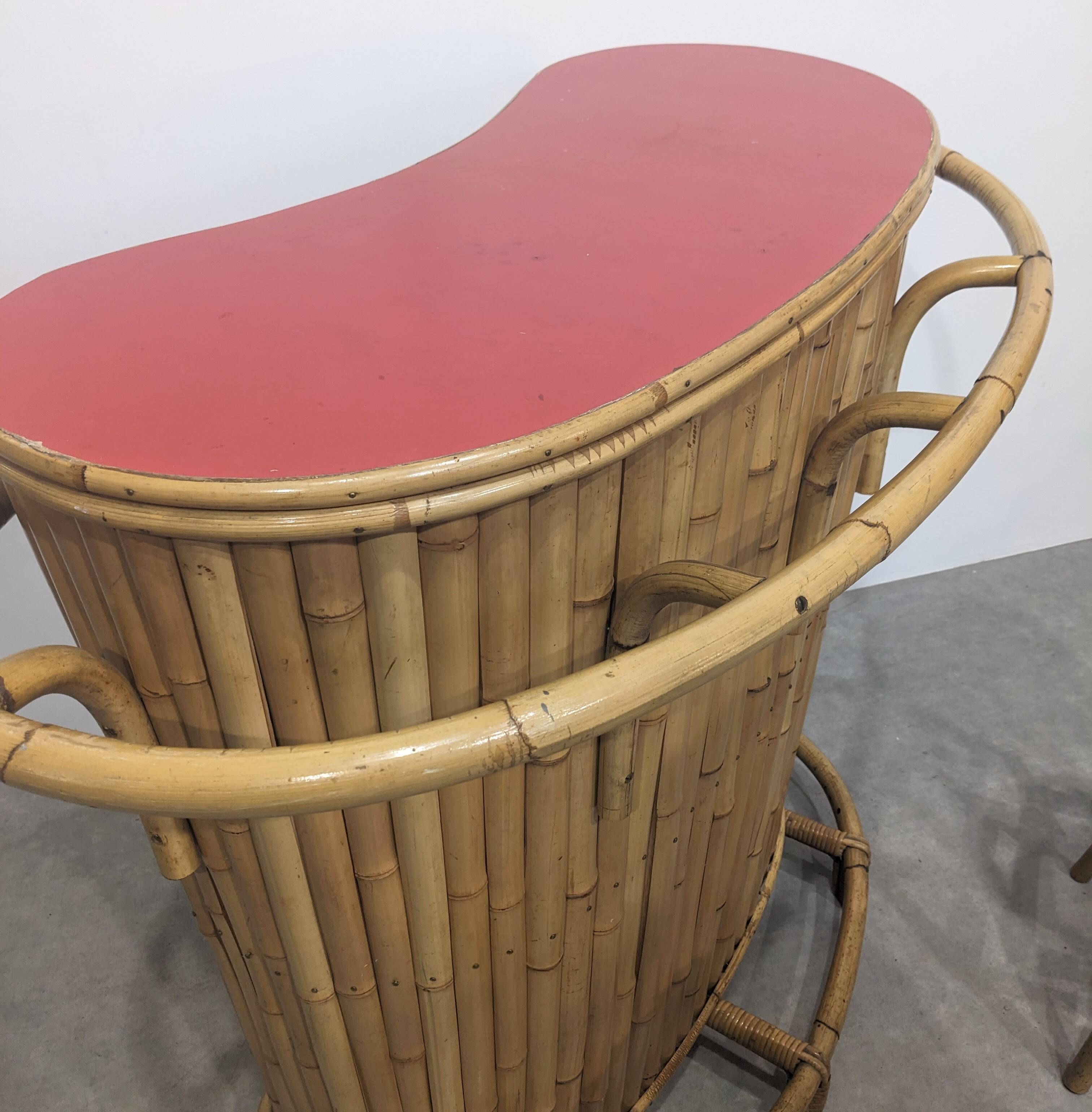 Vintage sixties tiki bar with stools.