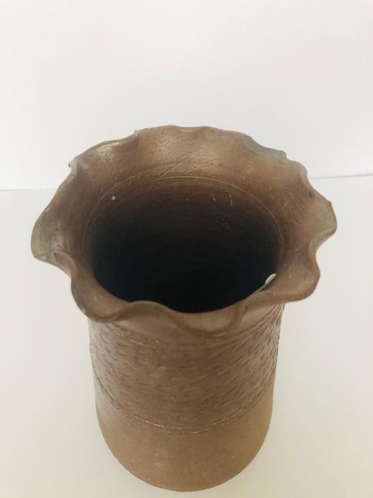 Brown earthenware vase