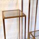Pull-out harnesses in gilded brass and smoked glass.