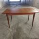Scandinavian teak table with built-in extension