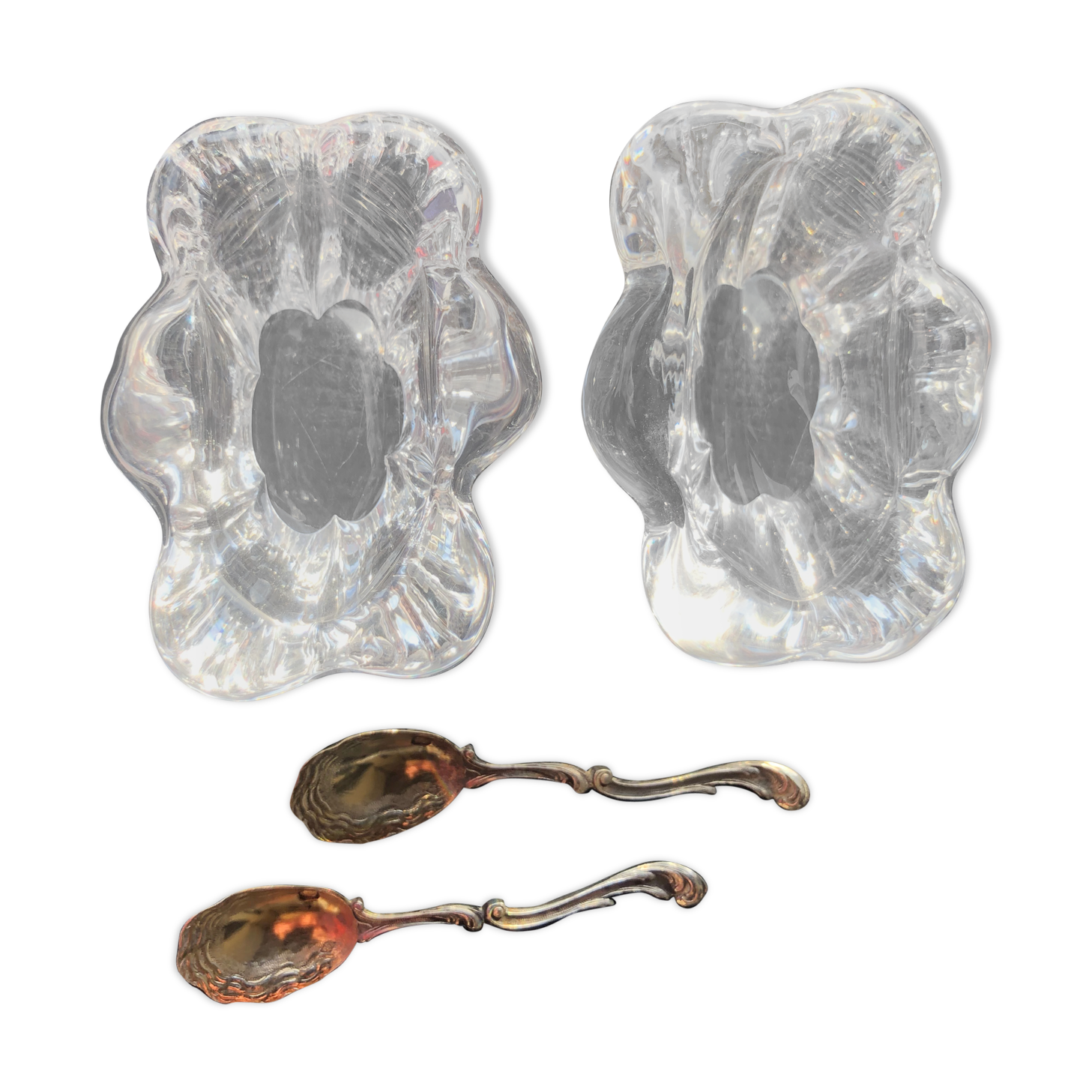 Daum crystal salts and silver spoons