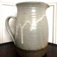 Enamelled sandstone jug signed vintage