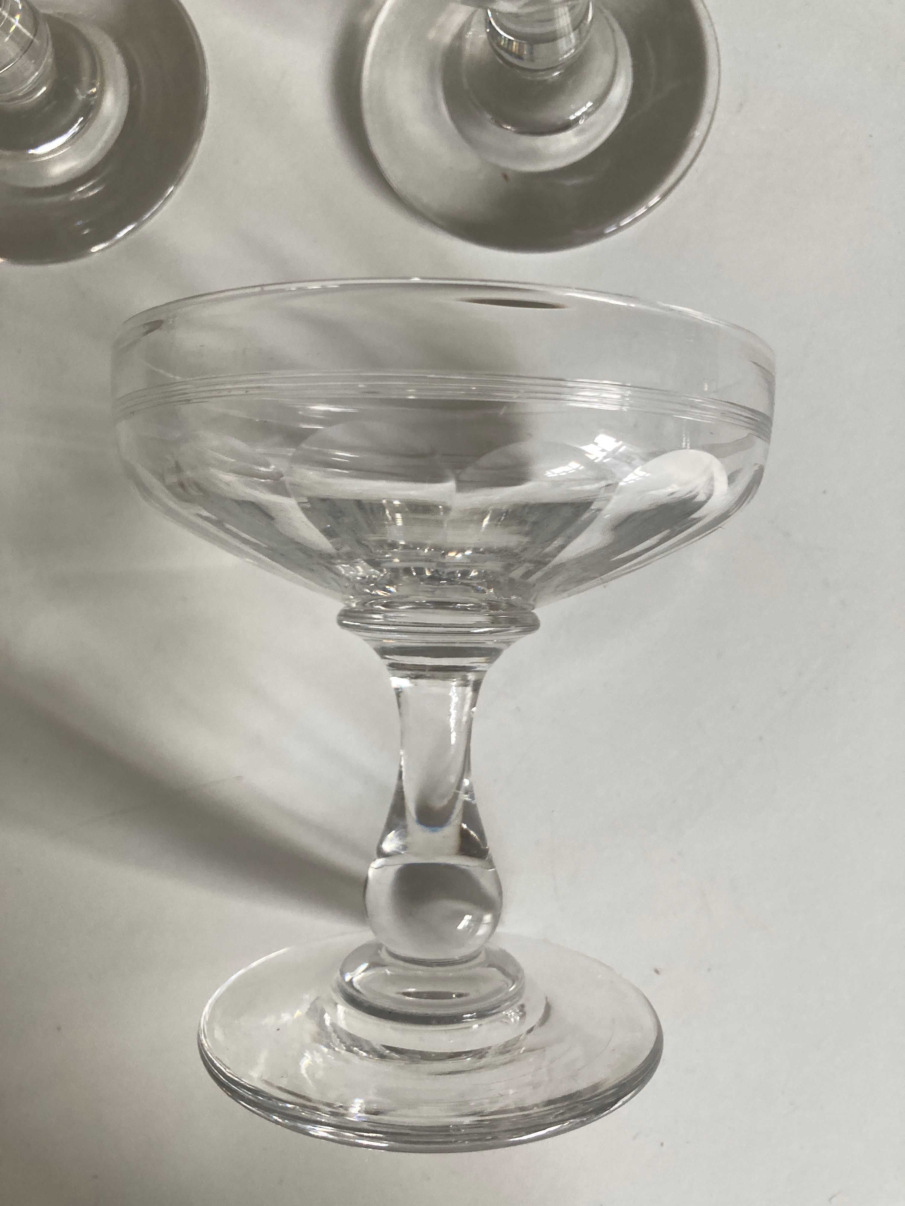 Set of 10 glasses of champagne 1870 in crystal ringing with flat ribs