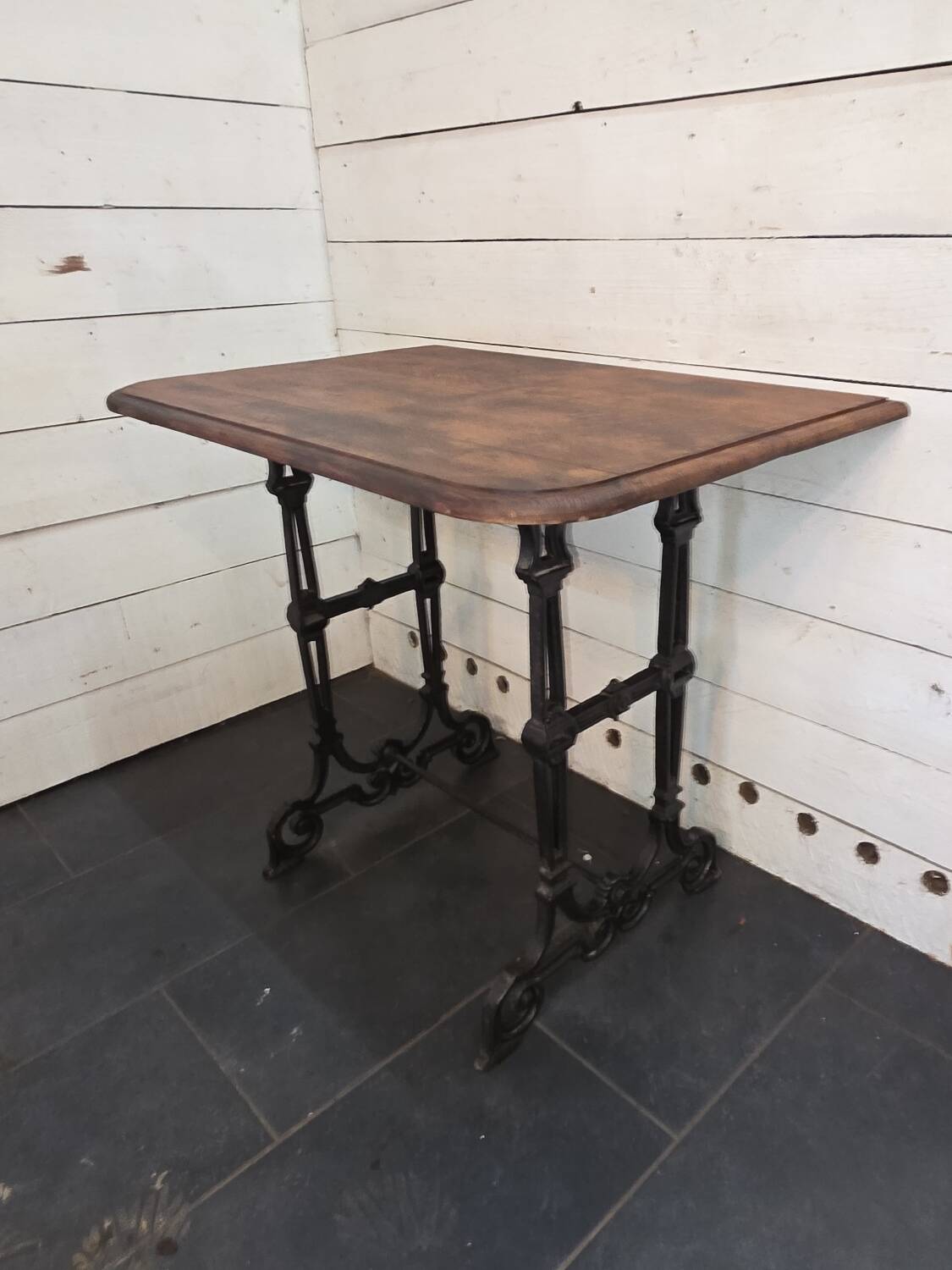Bistro table with cast iron legs and oak top