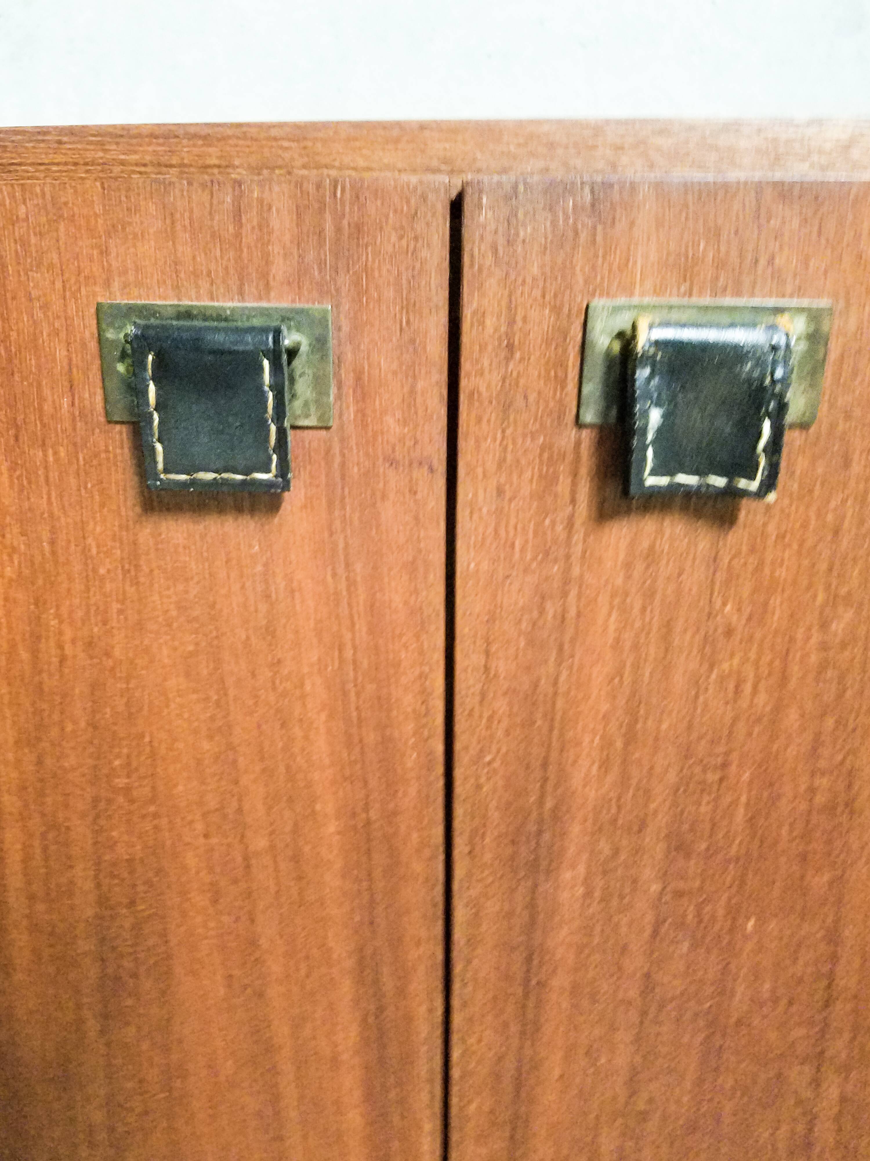 Teak bar cabinet and teak veneer, saddle leather and brass handles