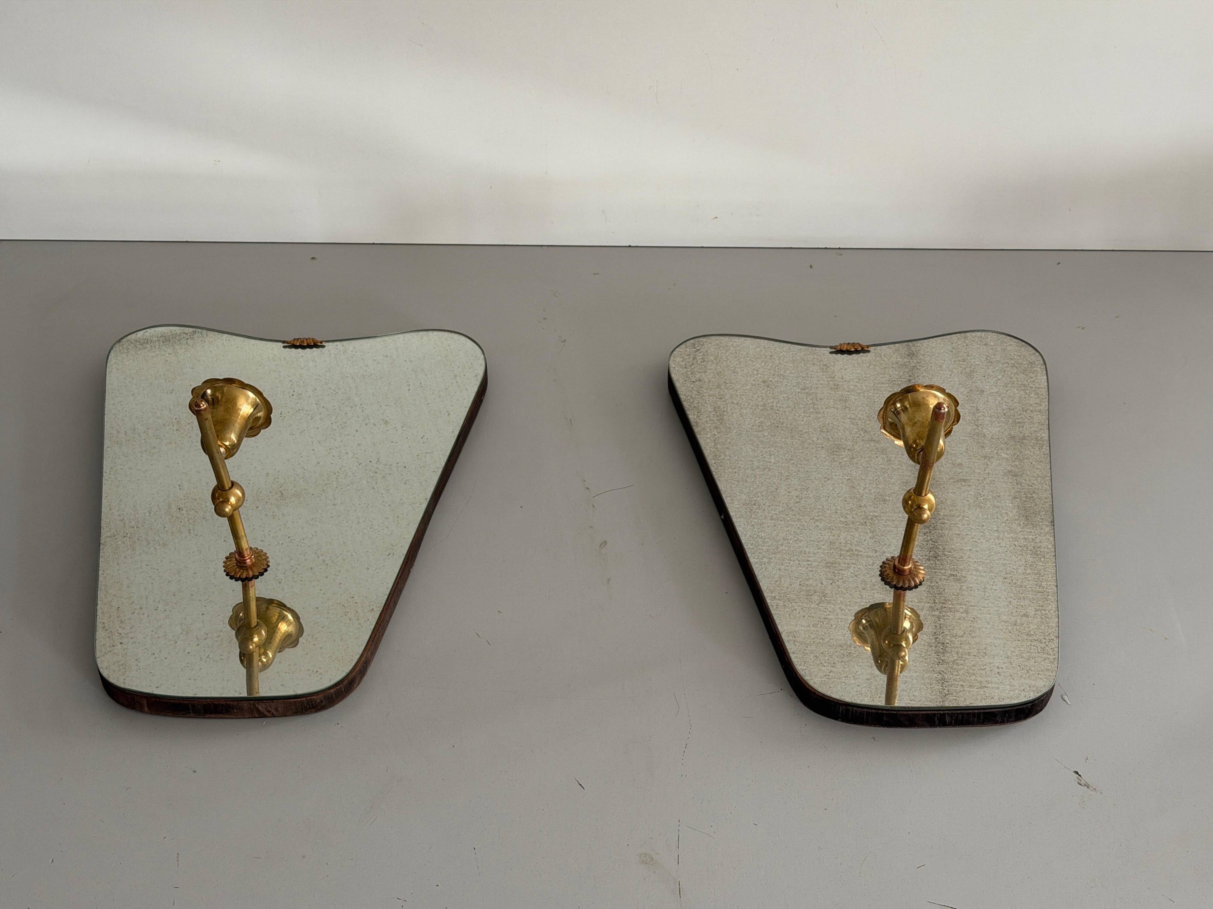Pair of brass wall lights with mirrors, mid-20th century, Italy, 1960.