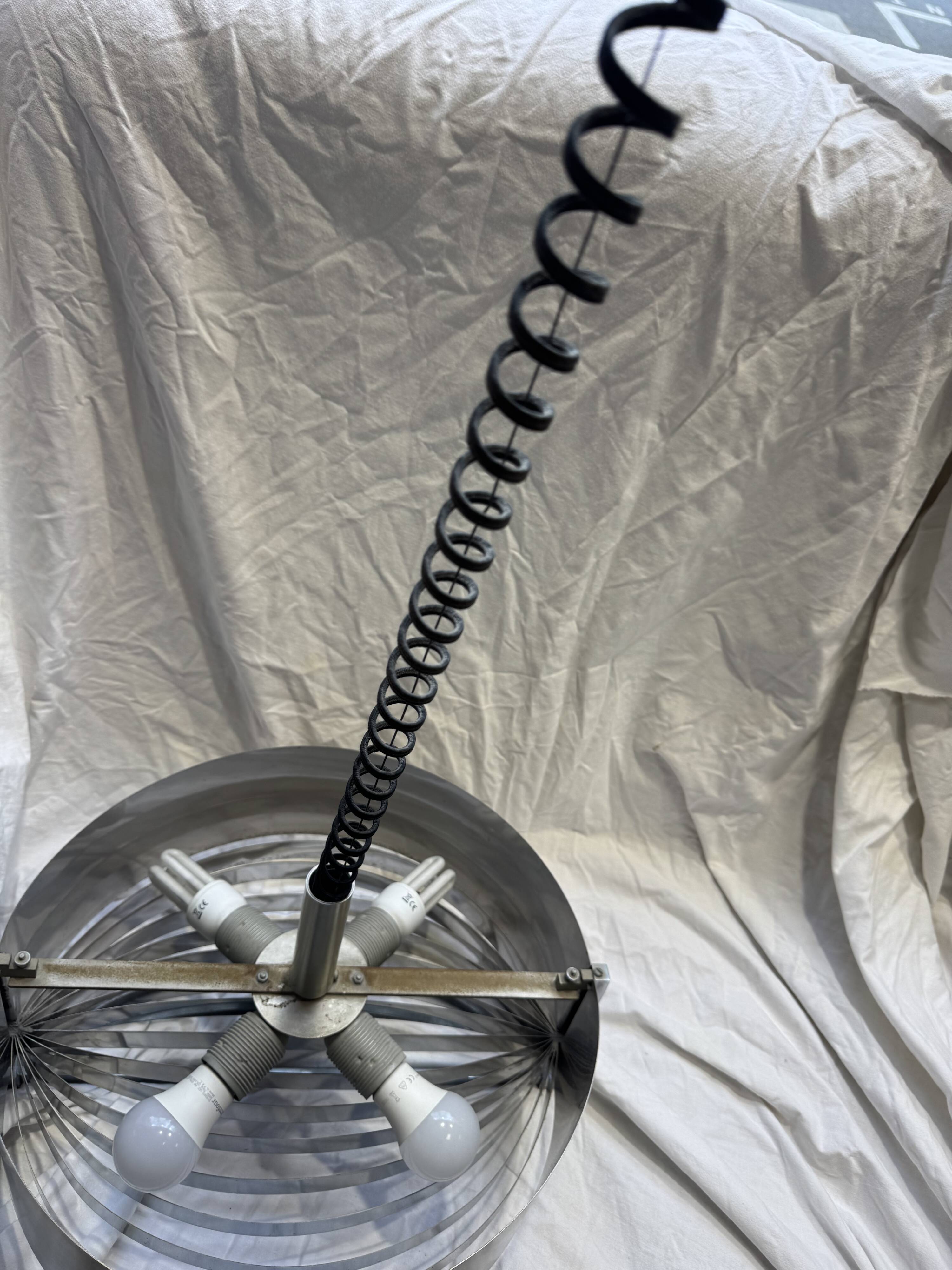 Brushed steel suspension