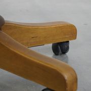 Dark green cowhide leather and wood chesterfield office chair on wheels