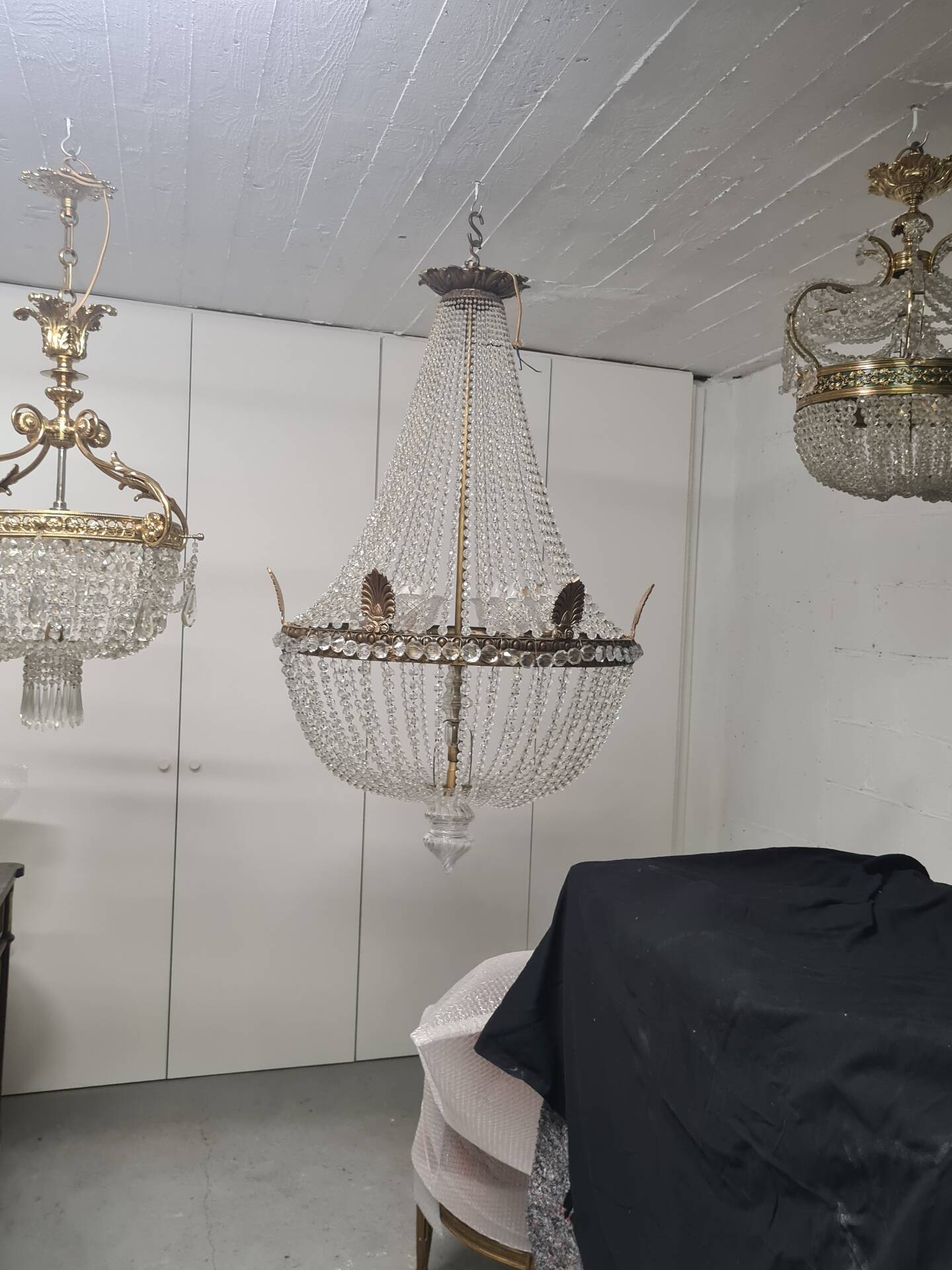 Large chandelier from the late 19th century in crystal and bronze.