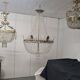 Large chandelier from the late 19th century in crystal and bronze.