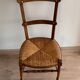 Chaise basse « nourrice » paillée vintage