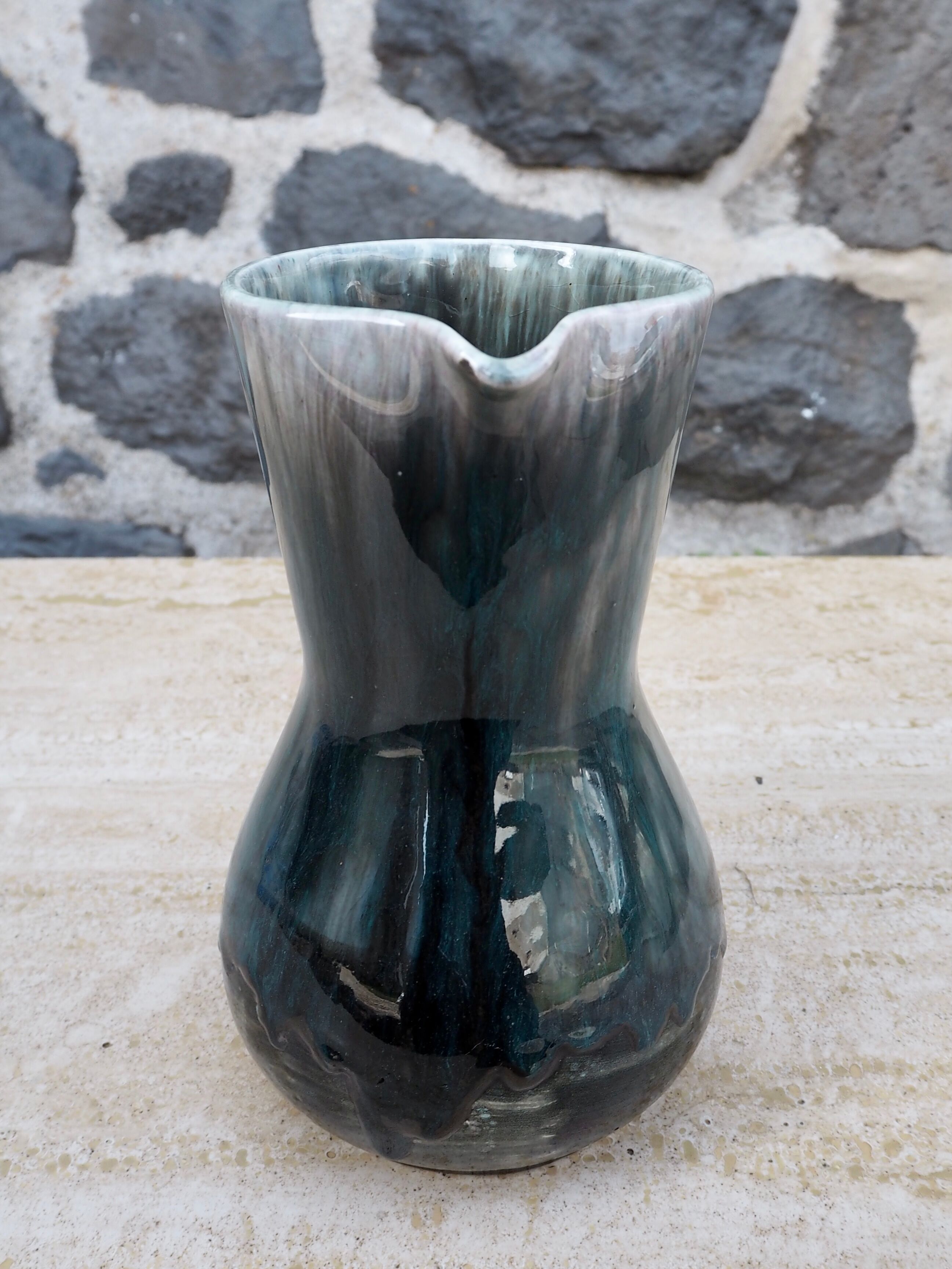 Enamelled ceramic pitcher signed Morvan