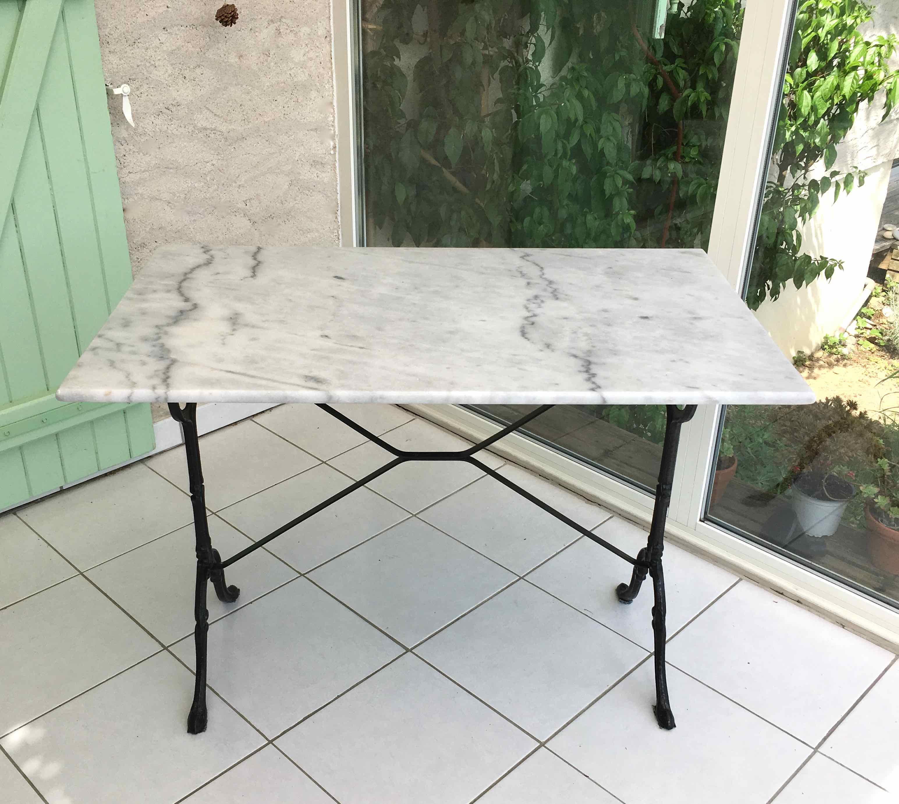 Marble and cast iron bistro table