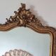 Antique Louis Philippe mirror with a pediment.