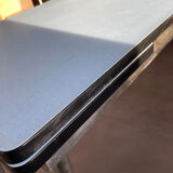 Blue Formica table for 4 to 6 people