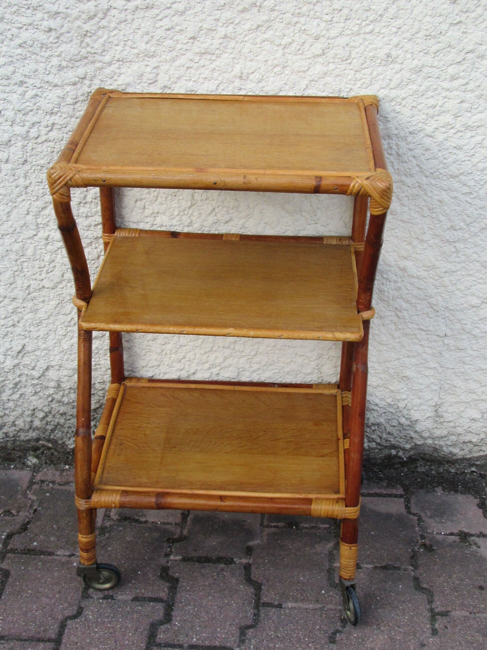 Rattan trolley on castors
